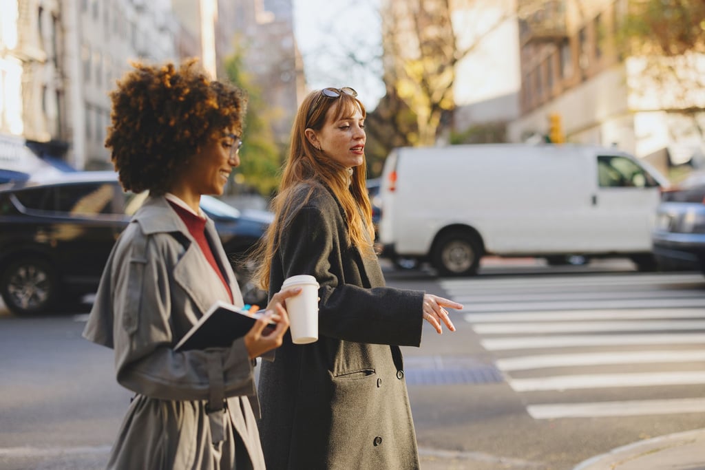 Two Women walking down New York City Streets